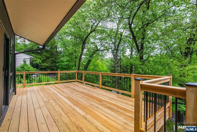deck with view of scattered trees