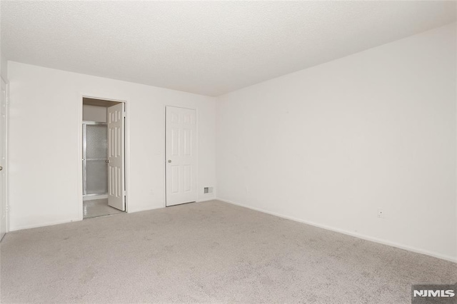398 Poets Way Unit 398, Mahwah, NJ 07430 - unfurnished bedroom with carpet flooring, baseboards, and connected bathroom
