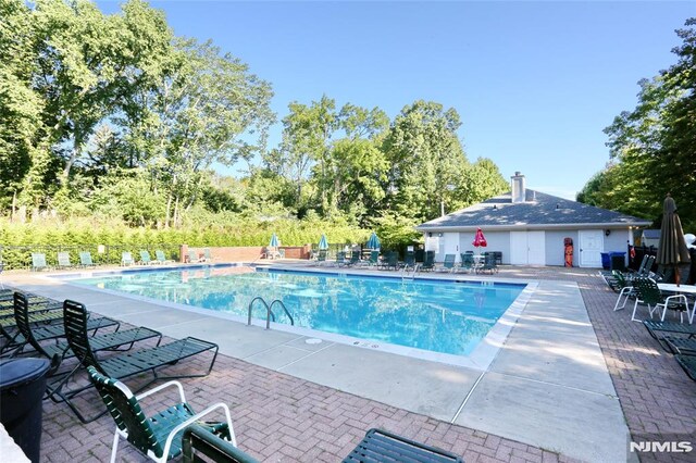 398 Poets Way Unit 398, Mahwah, NJ 07430 - community pool with a patio