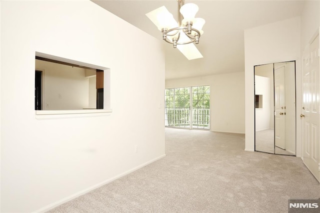 398 Poets Way Unit 398, Mahwah, NJ 07430 - carpeted spare room featuring a chandelier, baseboards, and high vaulted ceiling