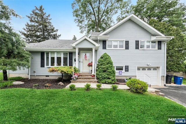 21 Ring Pl, Cedar Grove, NJ 07009 - split level home with a garage, a front lawn, and driveway