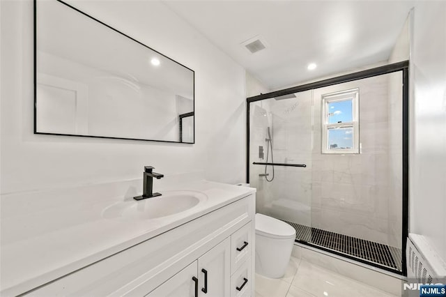 7 Edgewater Pl, Edgewater, NJ 07020 - full bath with toilet, a stall shower, vanity, tile patterned flooring, and recessed lighting