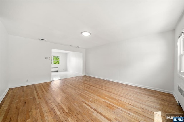 7 Edgewater Pl, Edgewater, NJ 07020 - unfurnished room with light wood finished floors and baseboards