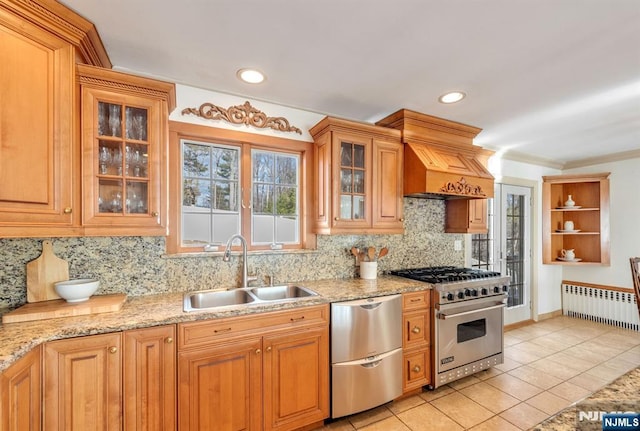 32 Brookside Dr, Upper Saddle River, NJ 07458 - kitchen with radiator, appliances with stainless steel finishes, a sink, light tile patterned flooring, and decorative backsplash