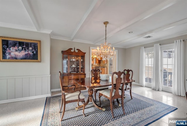 32 Brookside Dr, Upper Saddle River, NJ 07458 - dining room with a chandelier, beamed ceiling, dark speckled floor, ornamental molding, and baseboards