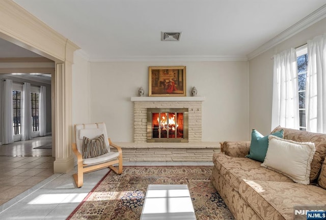32 Brookside Dr, Upper Saddle River, NJ 07458 - living area with plenty of natural light, ornamental molding, a fireplace, and tile patterned floors