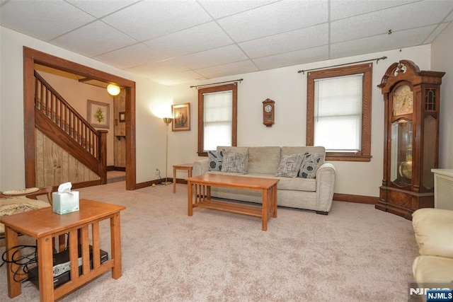 501 Collins Ave, Hasbrouck Heights, NJ 07604 - carpeted living room with stairs and a drop ceiling