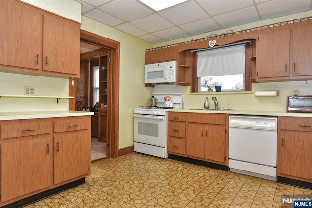 501 Collins Ave, Hasbrouck Heights, NJ 07604 - kitchen featuring white appliances, open shelves, light countertops, and a paneled ceiling