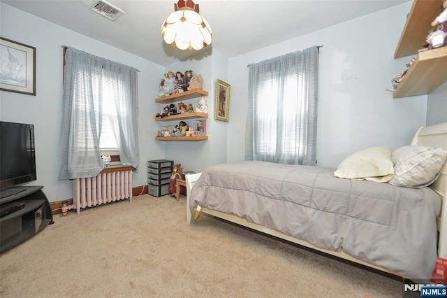 501 Collins Ave, Hasbrouck Heights, NJ 07604 - bedroom with radiator and carpet flooring