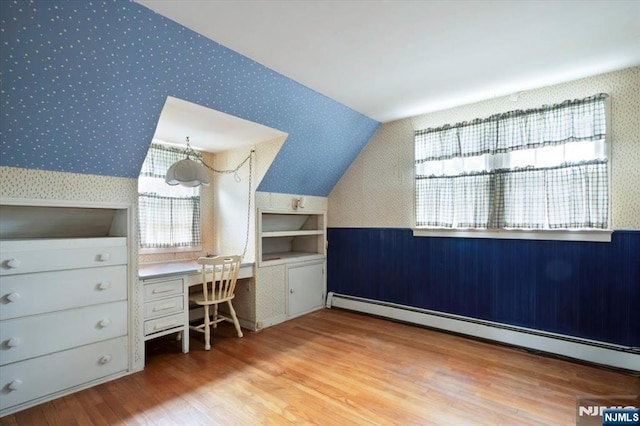 35 Mccosh Rd, Clifton, NJ 07043 - office area with wallpapered walls, a baseboard radiator, wood finished floors, and vaulted ceiling