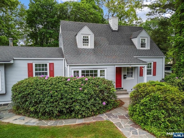 35 Mccosh Rd, Clifton, NJ 07043 - new england style home featuring a chimney and roof with shingles