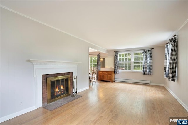 35 Mccosh Rd, Clifton, NJ 07043 - unfurnished living room with baseboard heating, light wood-type flooring, a fireplace with flush hearth, ornamental molding, and baseboards