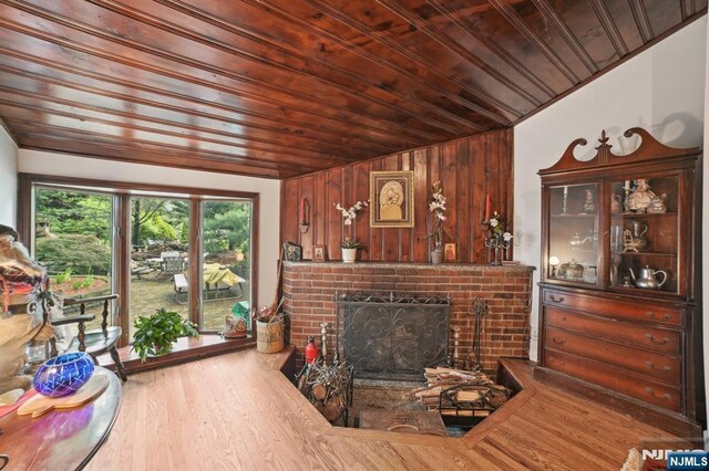 41-21 Dunkerhook Rd, Fair Lawn, NJ 07410 - living area with wooden ceiling, a fireplace, wood finished floors, and lofted ceiling