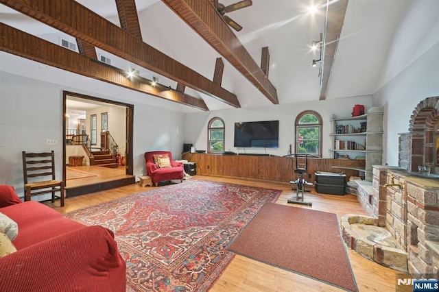 41-21 Dunkerhook Rd, Fair Lawn, NJ 07410 - living area featuring high vaulted ceiling, wood finished floors, and stairs