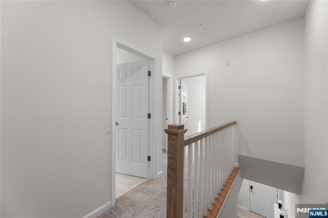 11 Arnold Dr, Wood Ridge, NJ 07075 - hallway featuring an upstairs landing, light colored carpet, recessed lighting, and baseboards