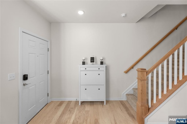 11 Arnold Dr, Wood Ridge, NJ 07075 - foyer featuring light wood finished floors, stairs, baseboards, and recessed lighting