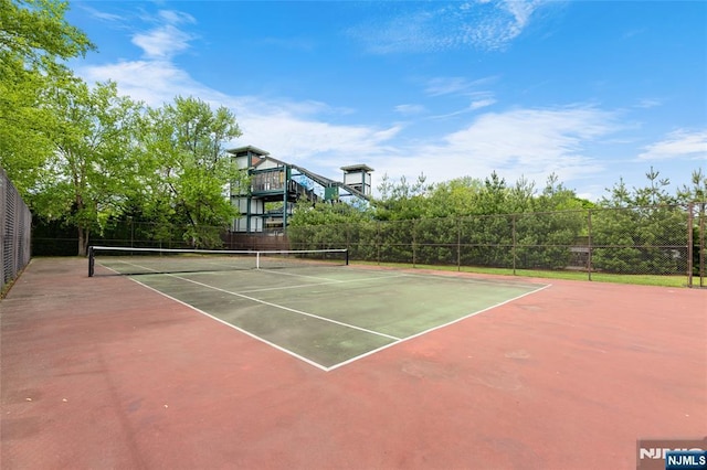 11 Arnold Dr, Wood Ridge, NJ 07075 - view of tennis court featuring fence and community basketball court