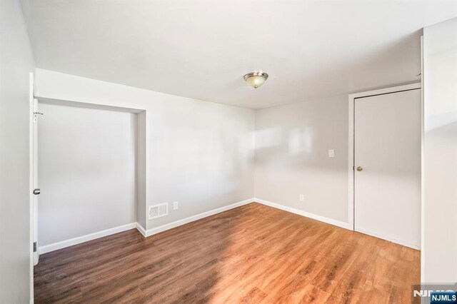 132 Hiawatha Blvd, Oakland, NJ 07436 - spare room with wood finished floors and baseboards