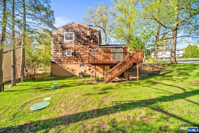 132 Hiawatha Blvd, Oakland, NJ 07436 - rear view of property with a wooden deck, stairs, and a yard