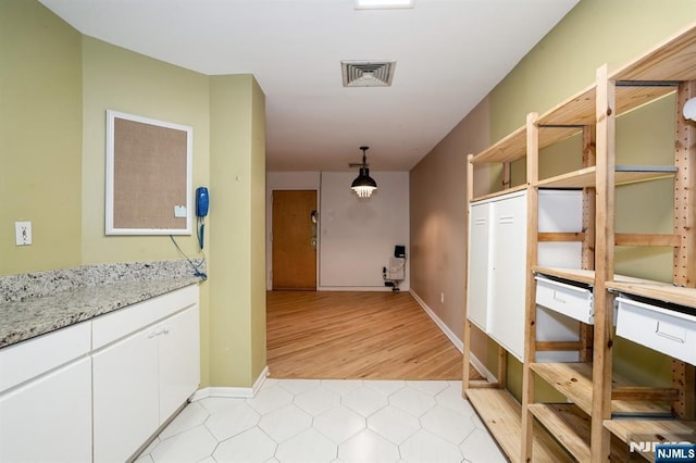 364 Palisade Ave Unit 4C, Cliffside Park, NJ 07010 - hallway featuring light tile patterned flooring and baseboards