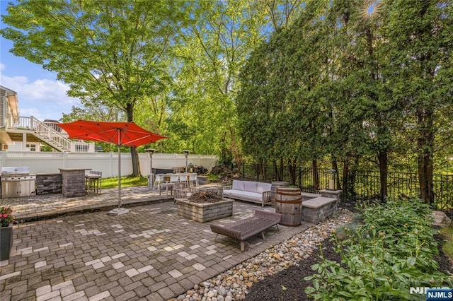 9 Summit Ave, Butler Borough, NJ 07405 - view of patio featuring outdoor lounge area, a grill, and a fenced backyard