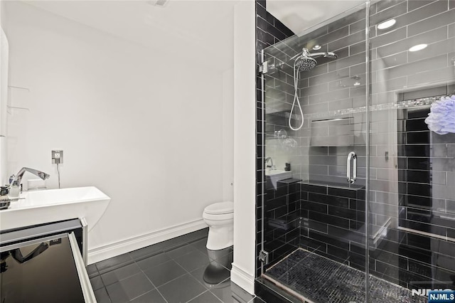 9 Summit Ave, Butler Borough, NJ 07405 - full bath with toilet, tile patterned floors, baseboards, a stall shower, and vanity