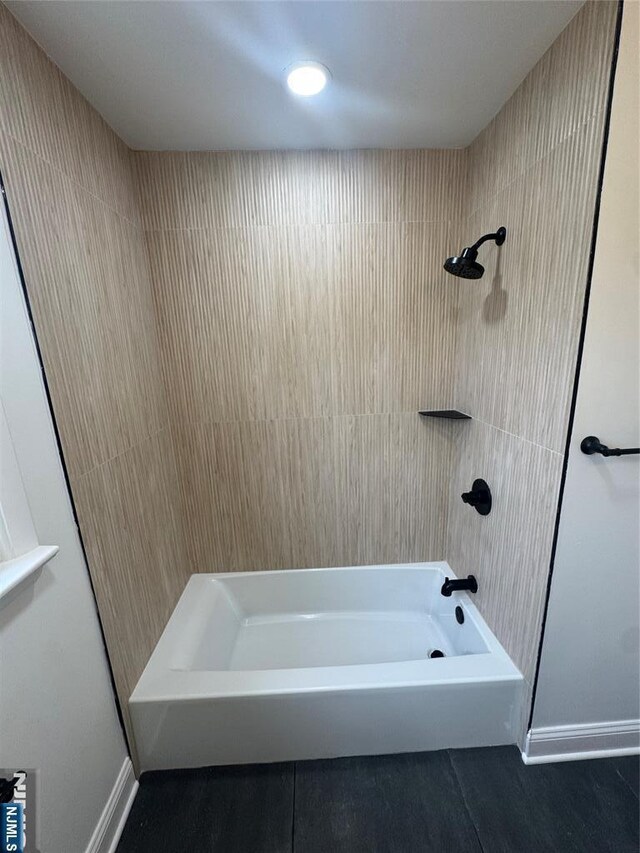 358 Bowden Rd, Cedar Grove, NJ 07009 - bathroom featuring baseboards and bathing tub / shower combination