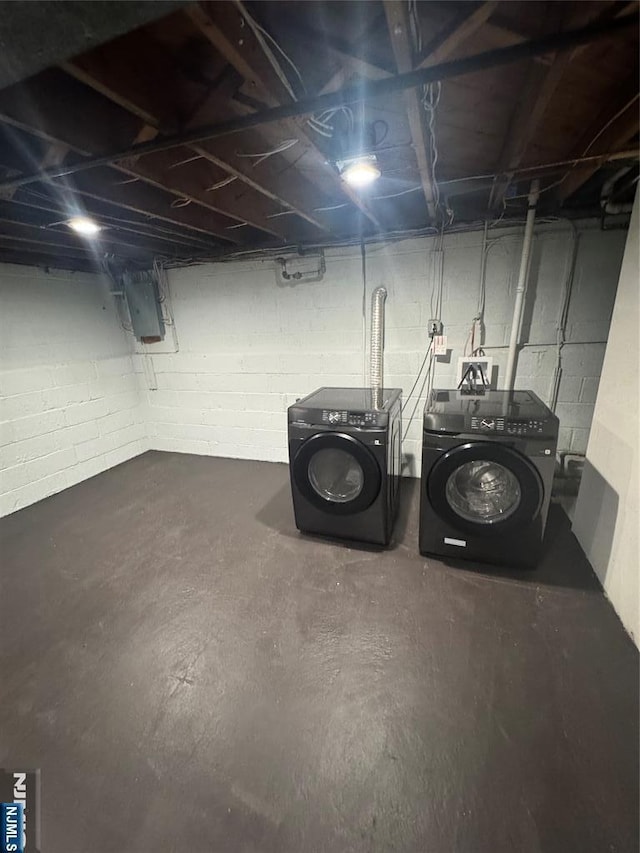 358 Bowden Rd, Cedar Grove, NJ 07009 - unfinished below grade area featuring washing machine and dryer, electric panel, and concrete block wall