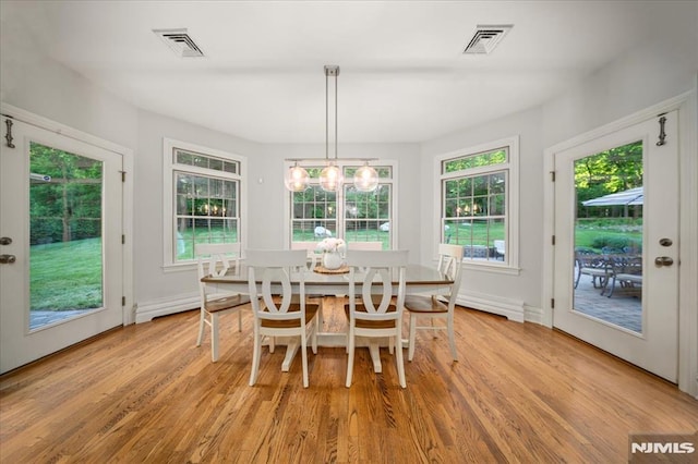17 Sunset Ln, Upper Saddle River, NJ 07458 - dining area with light wood-style flooring and baseboards