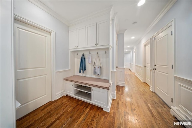 17 Sunset Ln, Upper Saddle River, NJ 07458 - mudroom with crown molding, a decorative wall, wood finished floors, a wainscoted wall, and recessed lighting