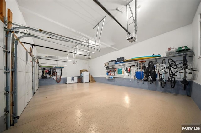 17 Sunset Ln, Upper Saddle River, NJ 07458 - garage with a garage door opener