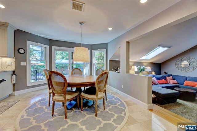 155 W Clinton Ave, Tenafly, NJ 07670 - dining space featuring a skylight, recessed lighting, baseboards, and light tile patterned floors