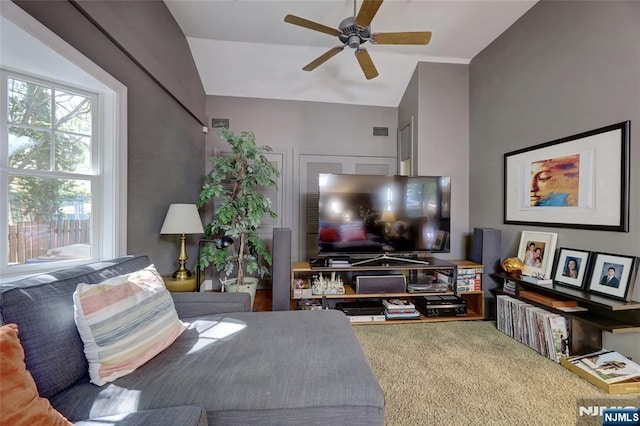 155 W Clinton Ave, Tenafly, NJ 07670 - carpeted living area with a ceiling fan and vaulted ceiling
