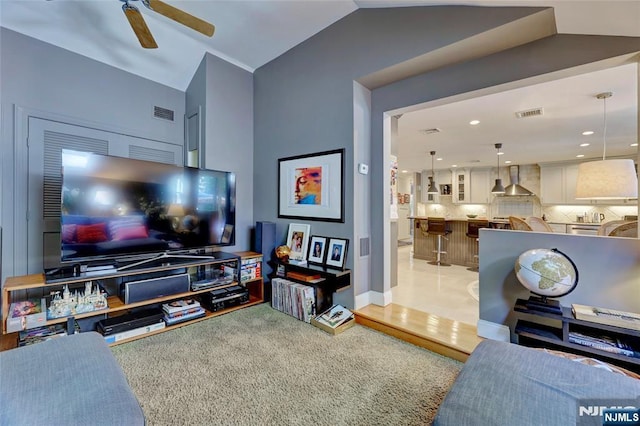 155 W Clinton Ave, Tenafly, NJ 07670 - living area with a ceiling fan, recessed lighting, baseboards, lofted ceiling, and light carpet