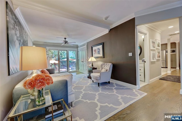 155 W Clinton Ave, Tenafly, NJ 07670 - living area featuring wood finished floors, baseboards, ornamental molding, and a ceiling fan