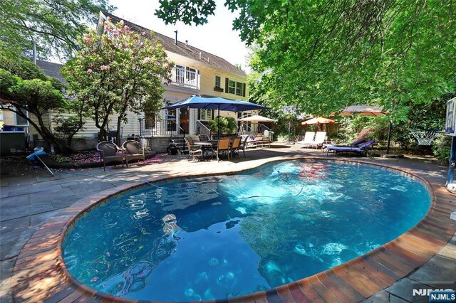155 W Clinton Ave, Tenafly, NJ 07670 - outdoor pool with a patio area and outdoor dining area