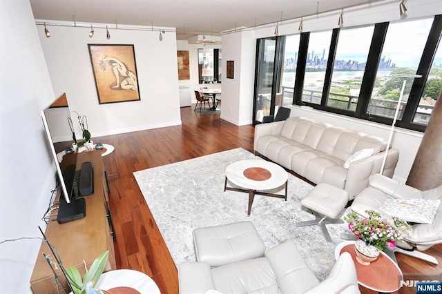 100 Carlyle Dr Unit 10Ds, Cliffside Park, NJ 07010 - living area featuring wood finished floors, baseboards, and a water view