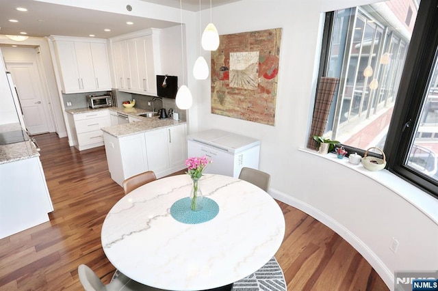 100 Carlyle Dr Unit 10Ds, Cliffside Park, NJ 07010 - kitchen featuring dark wood-style floors, white cabinets, baseboards, dishwasher, and recessed lighting