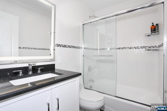 100 Carlyle Dr Unit 10Ds, Cliffside Park, NJ 07010 - full bath with vanity, combined bath / shower with glass door, and toilet