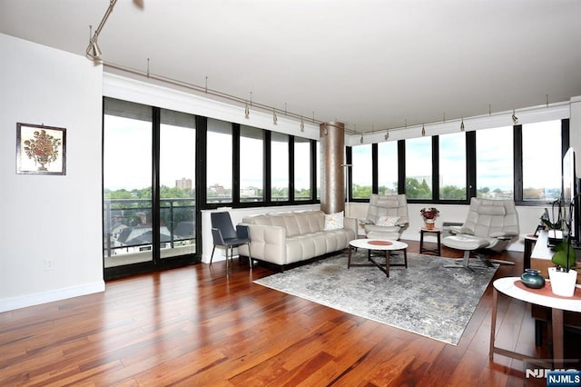 100 Carlyle Dr Unit 10Ds, Cliffside Park, NJ 07010 - living room featuring wood finished floors and baseboards
