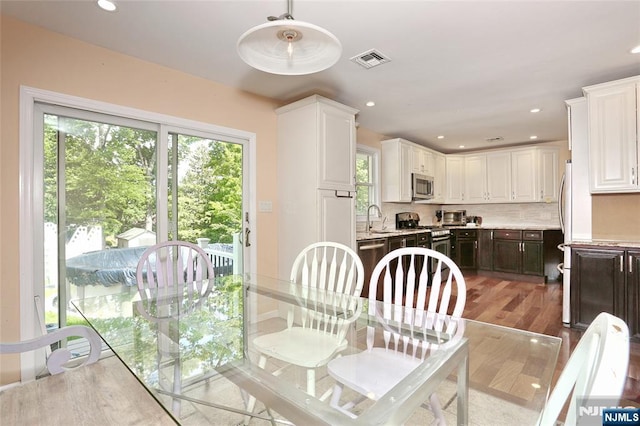 3-29 17th St, Fair Lawn, NJ 07410 - dining area featuring wood finished floors and recessed lighting