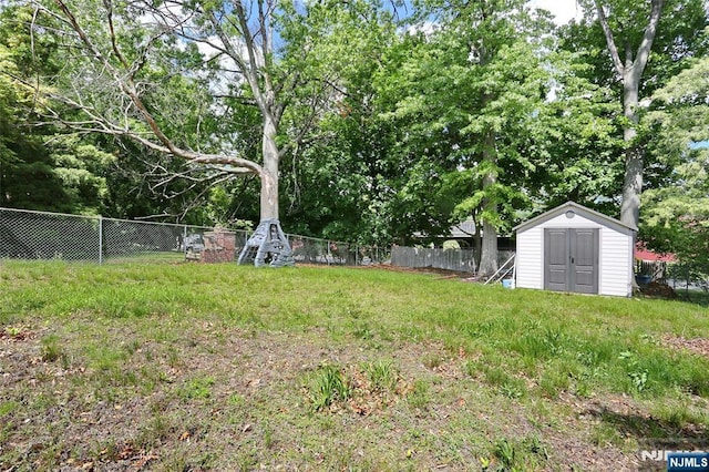 3-29 17th St, Fair Lawn, NJ 07410 - view of yard featuring a shed, fence, an outbuilding, and view of scattered trees