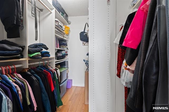 708 Harmon Cv, Secaucus, NJ 07094 - spacious closet featuring wood finished floors