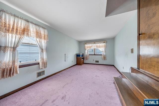36 Bogert St, Totowa, NJ 07512 - unfurnished living room featuring carpet and baseboards