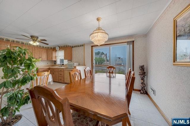 36 Bogert St, Totowa, NJ 07512 - dining area featuring a chandelier, a ceiling fan, light tile patterned flooring, baseboards, and wallpapered walls