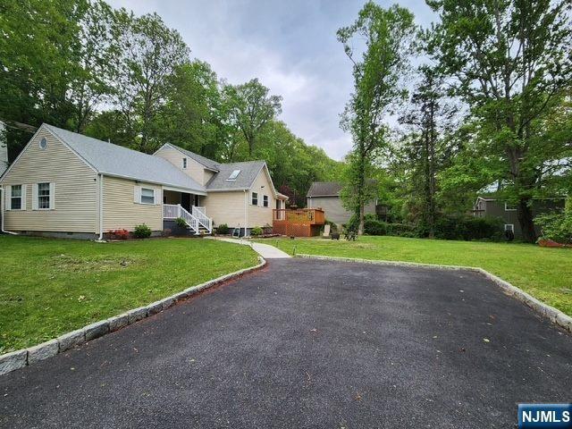 22 Elizabeth Rd, West Milford, NJ 07421 - view of front of house featuring a front lawn and crawl space