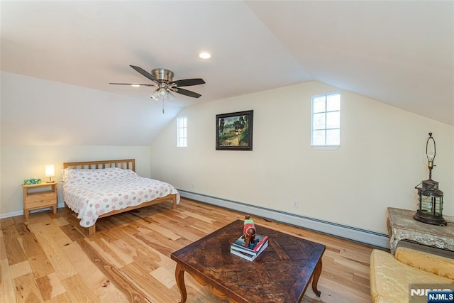 22 Elizabeth Rd, West Milford, NJ 07421 - bedroom with baseboard heating, lofted ceiling, wood finished floors, baseboards, and ceiling fan