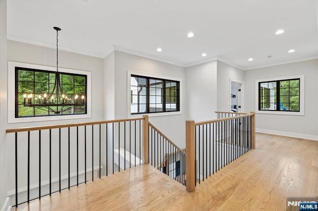 20 Aronow Pl, Mahwah, NJ 07430 - corridor with a chandelier, an upstairs landing, recessed lighting, wood finished floors, and baseboards