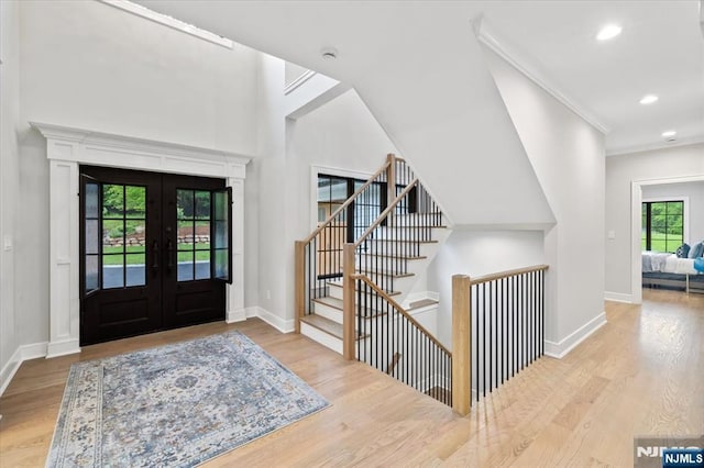 20 Aronow Pl, Mahwah, NJ 07430 - entryway featuring french doors, wood finished floors, baseboards, and recessed lighting