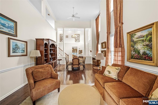 49 Quarry Dr, Woodland Park, NJ 07424 - living area featuring a towering ceiling, wood-type flooring, stairway, baseboards, and a ceiling fan
